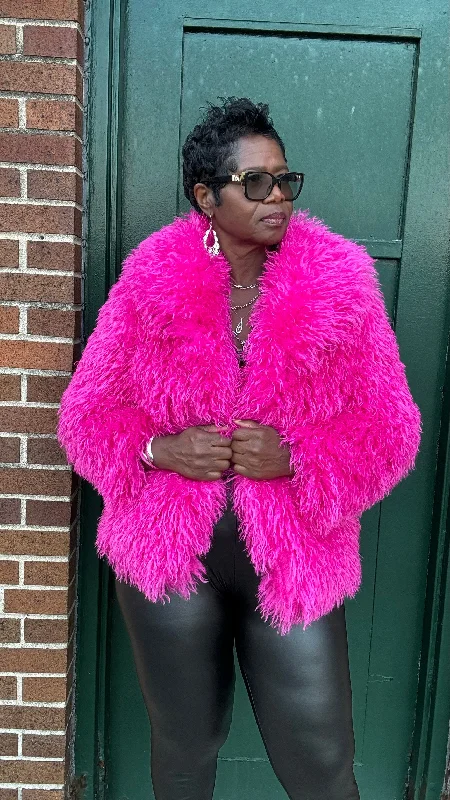 Tasha has a pink furry jacket